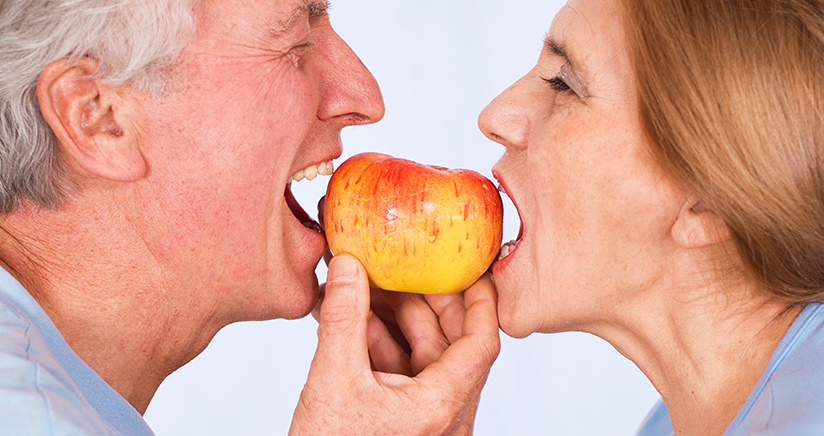 Couple Eating an Apple
